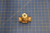 SP Belimo Valve 4.4Cv Bronze Body, SS on blue mat with a measuring grid